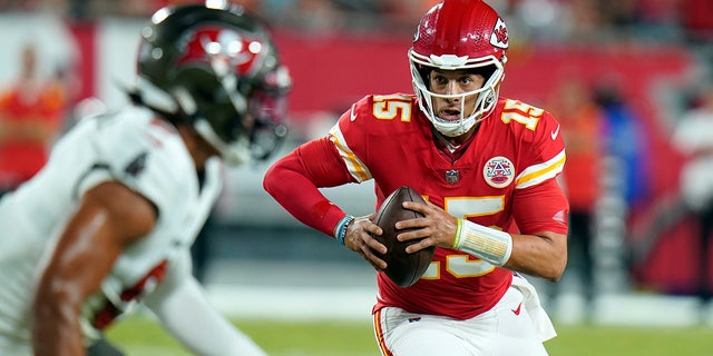 Kansas City Chiefs quarterback Patrick Mahomes (15) scrambles during the first half against the Tampa Bay Buccaneers on Oct. 2, 2022, in Tampa, Florida.