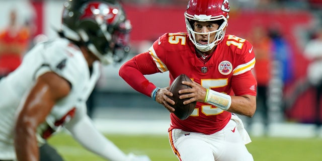 Kansas City Chiefs quarterback Patrick Mahomes (15) scrambles during the first half against the Tampa Bay Buccaneers on Oct. 2, 2022, in Tampa, Florida.