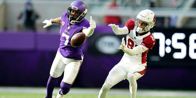 Minnesota Vikings cornerback Patrick Peterson (7) interrupts a pass intended for Arizona Cardinals wide receiver Robbie Anderson (81) in the second half of the game.  December 30, 2022 in Minneapolis.