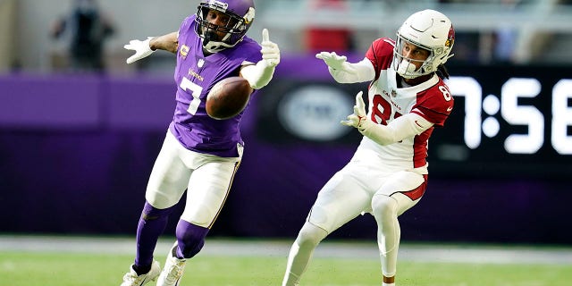 Minnesota Vikings cornerback Patrick Peterson (7) interrupts a pass intended for Arizona Cardinals wide receiver Robbie Anderson (81) in the second half of the game.  December 30, 2022 in Minneapolis.