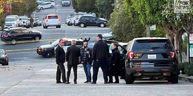 FBI investigators are seen outside the home of Nancy and Paul Pelosi where Paul was the victim of a violent home invasion, Friday, Oct. 28, 2022.