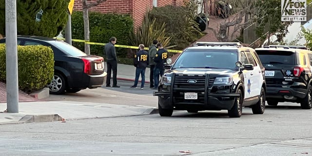 FBI investigators are seen outside the home of Nancy and Paul Pelosi where Paul was the victim of a violent home invasion, Friday, Oct, 28, 2022.