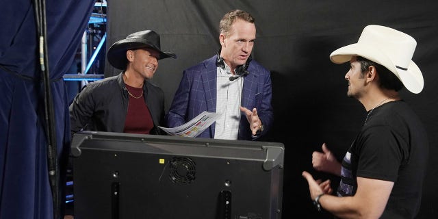 Tim McGraw, Peyton Manning and Brad Paisley during an ABC special.