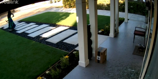 The woman in the video is later seen walking away from the California property.