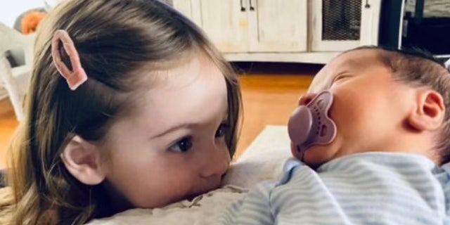 Five-month-old Hollace Bennard and his big sister, 2-year-old Lilly. The children were killed on Wednesday by the family's pit bulls.