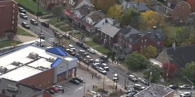 The aftermath of a Pittsburgh funeral shooting is seen from above Friday, Oct. 28, 2022.