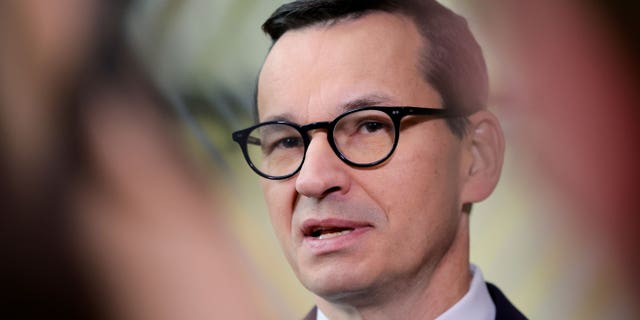 FILE - Polish Prime Minister Mateusz Morawiecki speaks to the media as he arrives for an EU summit in Brussels on October 21, 2022. Morawiecki said late Friday, October 28, 2022 that Poland's nuclear energy project will use the "reliable and safe technology" of Westinghouse Electric Company, establishing a strong Poland-US alliance "ensures the success of our joint initiatives." (Photo AP / Olivier Matthys, File)