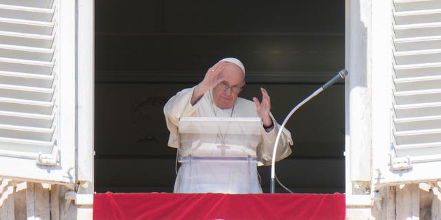 Pope at his window overlooking St. Peter's Square