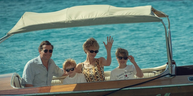 In the first set of photos, Princess Diana -- played by Elizabeth Debicki -- is pictured on a speedboat next to a young Prince Williams, (Timothee Sambor) and Prince Harry (Teddy Hawley.) 