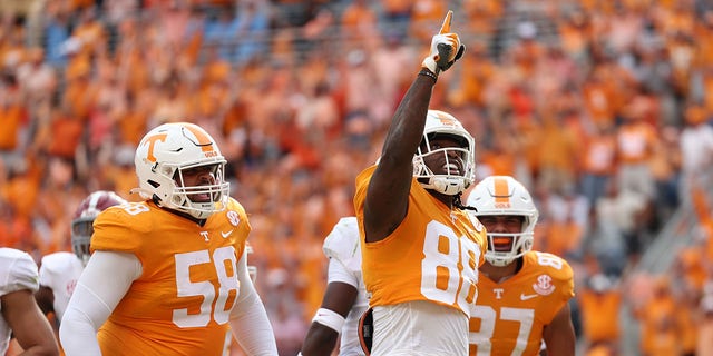 Tennessee tight end Princeton Fant (88) celebrates with offensive lineman Darnell Wright (58) after a big play against Alabama at Neyland Stadium on Oct. 15, 2022, in Knoxville, Tennessee.