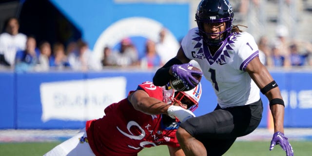 TCU wide receiver Quentin Johnston (1) catches a pass against Kansas in the first half at David Booth Kansas Memorial Stadium on Oct. 8, 2022, in Lawrence, Kansas.