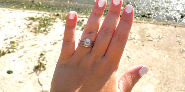 Garner flaunts her wedding ring, which was found lying in the bush after Hurricane Ian passed through Fort Myers, Florida, in this undated photo courtesy of Ashley Garner.