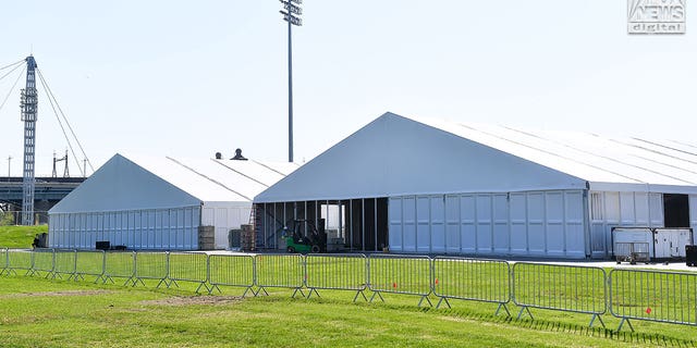 General views of migrant shelter tents being erected on Randall's Island in New York City, Tuesday, October 11, 2022.