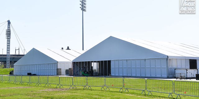 General views of migrant shelter tents being erected on Randall's Island in New York City, Tuesday, October 11, 2022.