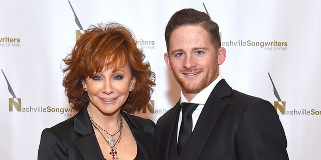 Country artist Reba McEntire and son Shelby Blackstock attend the 2018 Nashville Songwriters Hall Of Fame Gala at Music City Center Oct. 28, 2018, in Nashville.  