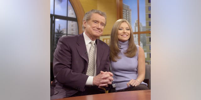 Regis Philbin introduced new co-host Kelly Ripa in July 2001 after Kathie Lee Gifford left the program.