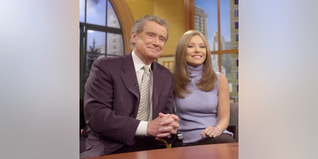 Regis Philbin introduced new co-host Kelly Ripa in July 2001.