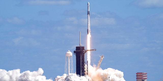 A SpaceX Falcon 9 rocket and the Dragon capsule, with a multinational crew of four astronauts, lifts off from Launch Complex 39-A Wednesday, Oct. 5, 2022, at the Kennedy Space Center in Cape Canaveral, Fla., beginning a five-month mission to the International Space Station.