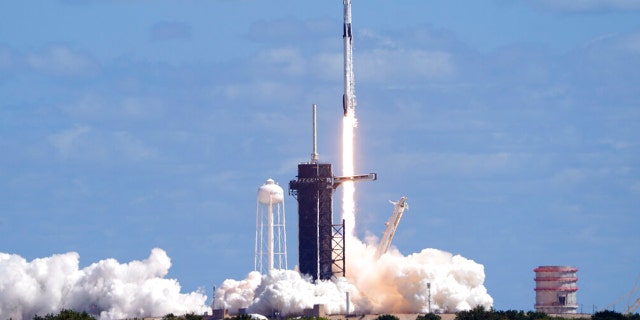 A SpaceX Falcon 9 rocket and the Dragon capsule, with a multinational crew of four astronauts, lifts off from Launch Complex 39-A Wednesday, Oct. 5, 2022, at the Kennedy Space Center in Cape Canaveral, Fla., beginning a five-month mission to the International Space Station.