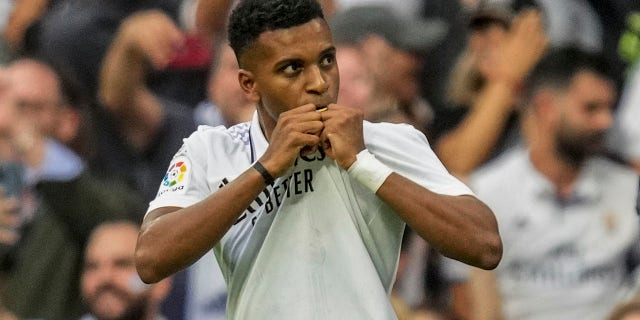Real Madrid's Rodrygo celebrates after scoring a penalty kick against FC Barcelona in Madrid, Spain, on Sunday, Oct. 16, 2022.