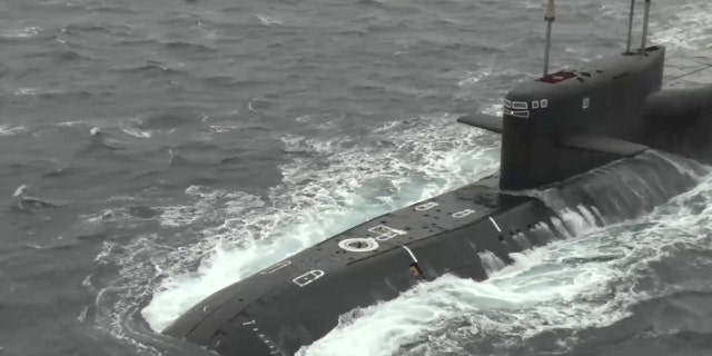 The Russian strategic ballistic missile submarine Tula during exercises held by the country's strategic nuclear forces in an unknown location, in this image from a video released on October 26, 2022.