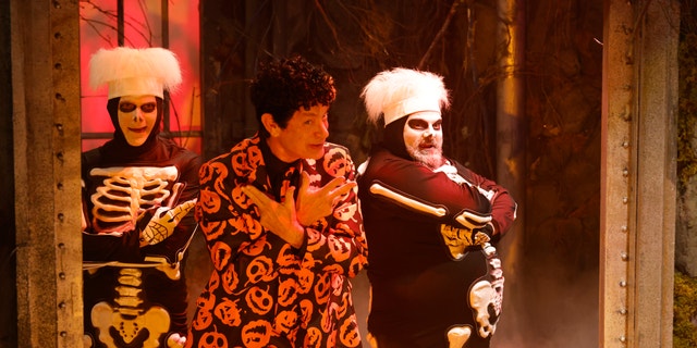 Mikey Day, Tom Hanks, and Bobby Moynihan dance during David S. Pumpkins sketch on "SNL."