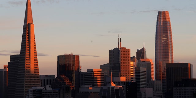 FILE: The Transamerica Pyramid and Sales Force tower are seen at sunset in San Francisco, Calif., on Monday, Jan. 17, 2022.