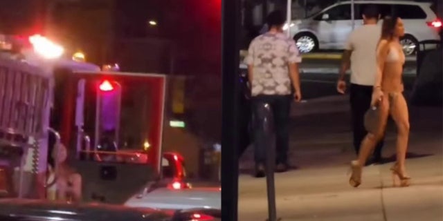 Bikini clad woman exiting fire truck