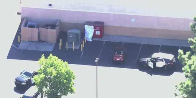 A woman was found dead Thursday in a clothing donation box near Los Angeles, authorities said. 