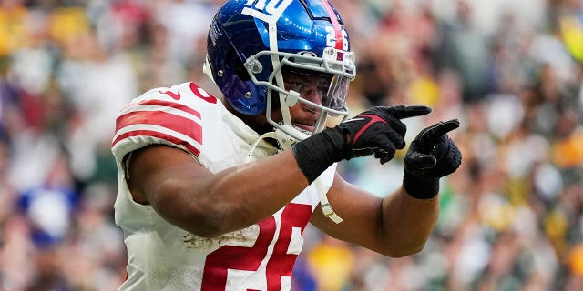 Saquon Barkley celebra un TD