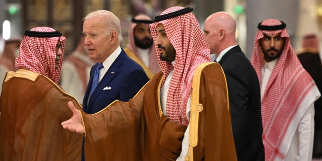 President Joe Biden (C-L) and Saudi Crown Prince Mohammed bin Salman (C) arrive for the family photo during the Jeddah Security and Development Summit (GCC+3) at a hotel in Saudi Arabia's Red Sea coastal city of Jeddah on July 16, 2022. 