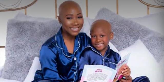 Savannah Brown, 8, and her mom Ruqayyah Qaiyim after her family members shaved their heads in support of Brown's battle with alopecia.