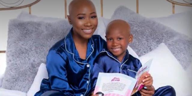 Eight-year-old Savannah Brown and her mother, Ruqaiyah Kaiyim, after the family shaved their heads to help Brown fight alopecia.