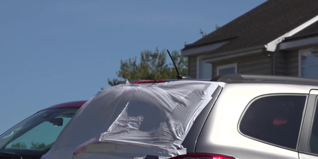 The back window of a vehicle was shot out near the scene. 