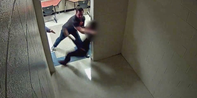 Quintin Proctor says he was thrown by an administrator into a wall.
