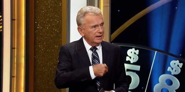 Pat Sajak continues to remind contestants of the rules on the "Wheel of Fortune" game show.