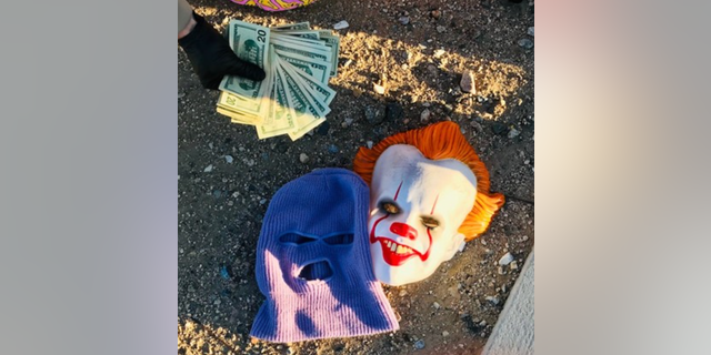 Authorities recovered a clown mask and 0 the suspect allegedly stole from one of the victims.