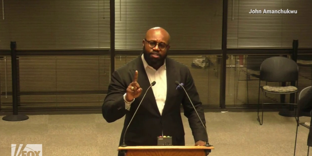 North Carolina Pastor John Amanchukwu speaking at a Wake County School Board meeting. 