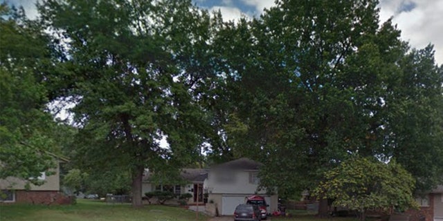 The home in Shawnee, Kansas, where 17-month old Nicholas Ecker Jr. perished in a house fire lit by his father.