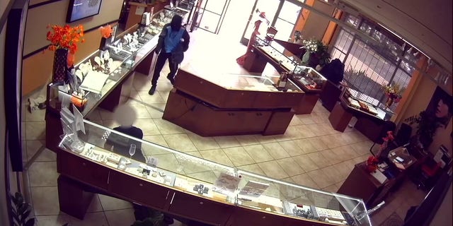 Two disguised intruders stole thousands of dollars of fine jewelry from a jewelry store in California.
