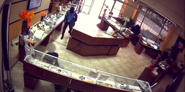 Two disguised intruders stole thousands of dollars of fine jewelry from a jewelry store in California.