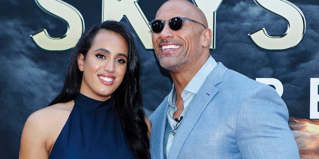 Actor Dwayne Johnson and daughter Simone Alexandra Johnson attend the premiere "Skyscraper" July 10, 2018 in New York City.