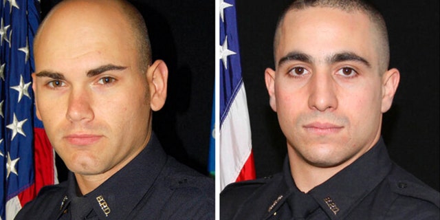 LR: Bristol, Conn. Police Department Sgt. Dustin Demonte, Officer Alex Hamzy.