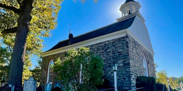 The Dutch church of Sleepy Hollow, New York, where a Hessian soldier who lost his head in battle was said to be buried, arising each night to search for his missing skull.