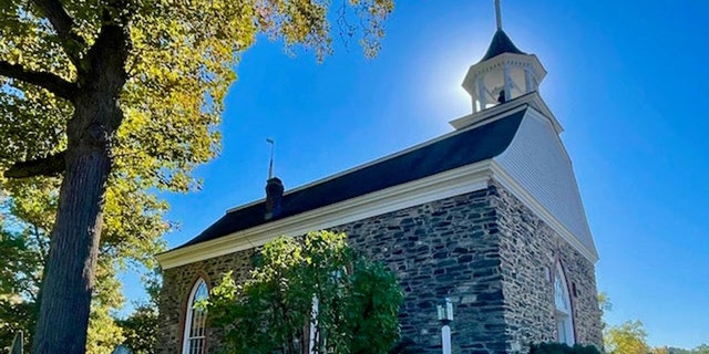 The Dutch church of Sleepy Hollow, New York, where a Hessian soldier who lost his head in battle was said to be buried, arising each night to search for his missing skull. 