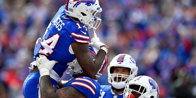 Buffalo Bills wide receiver Stefon Diggs, #14, celebrates after scoring on a pass from quarterback Josh Allen during the first half of an NFL football game against the Pittsburgh Steelers in Orchard Park, New York, Sunday, Oct. 9, 2022. 