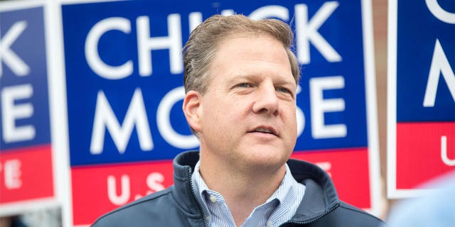 New Hampshire Gov. Chris Sununu at a campaign stop for Republican Senate candidate Chuck Morse at the Bedford High School polling location in Bedford, N.H., on Sept. 13, 2022.