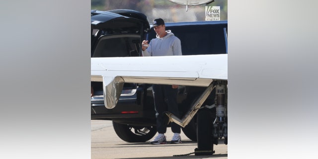 Tom Brady touched down solo from New York City after attending the surprise wedding of Robert Kraft. The rest of the team and coaching staff had arrived 20 minutes later on the team plane.