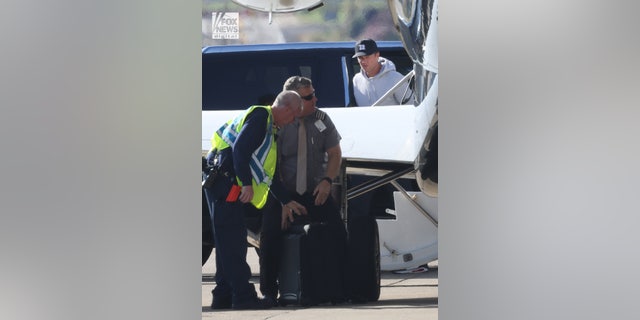 Tom Brady was coming back from Robert Kraft's wedding to meet his team.