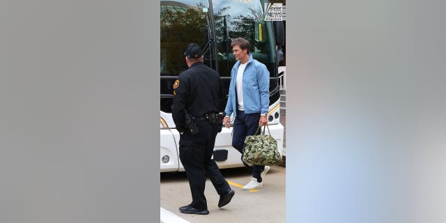 Tom Brady leaves his team hotel ahead of the Bucs' game against the Steelers.